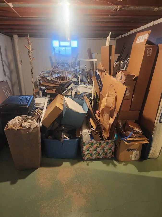 Roll-off dumpster container at job site for Concrete Dumpster Rental in Greenhills